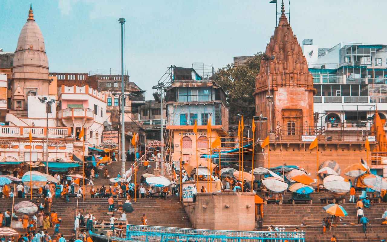 Wooden boat resting beside the stone steps of a Varanasi ghat