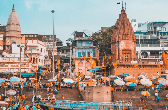 Wooden boat resting beside the stone steps of a Varanasi ghat