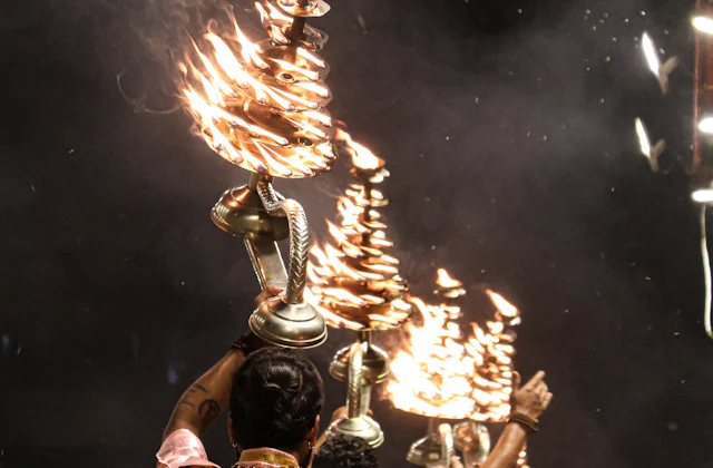 Morning Ganga aarti being performed at Assi Ghat in Varanasi