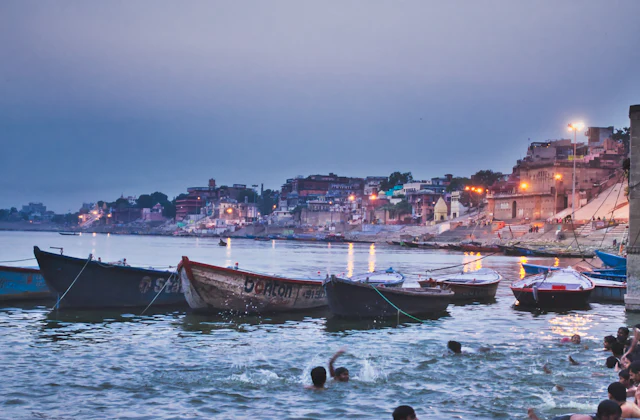 Deep blue early morning over the Ganga and the Varanasi skyline