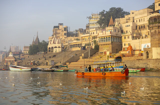 A temple spire above the Ganga at sunset in Varanasi